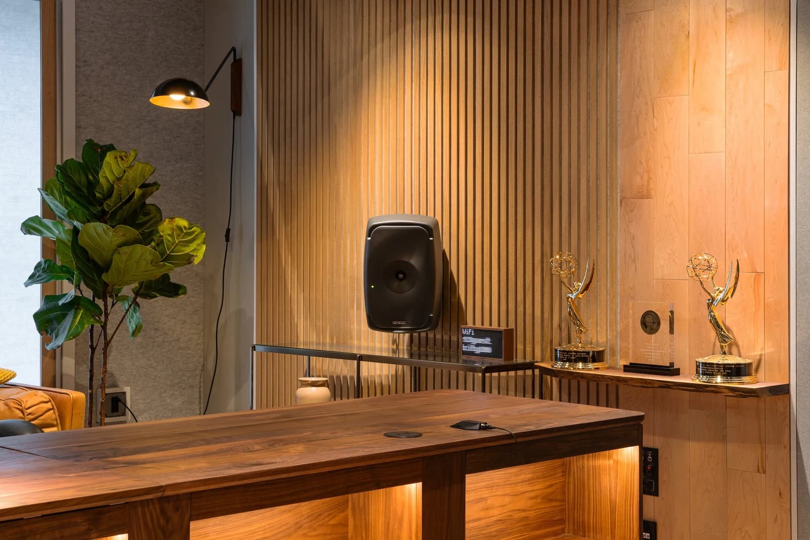 Wood slats, maple surfaces and task lighting in Studio A’s rear producer seating area.