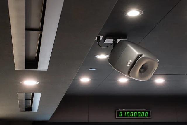 Studio A’s overhead Genelec speaker, soffits, lighting, slot diffusers and timecode display.