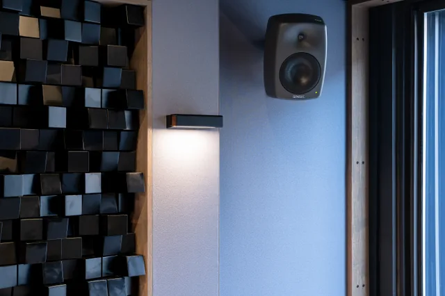 Studio B’s rear diffuser, sconce, surround speaker and window detail.